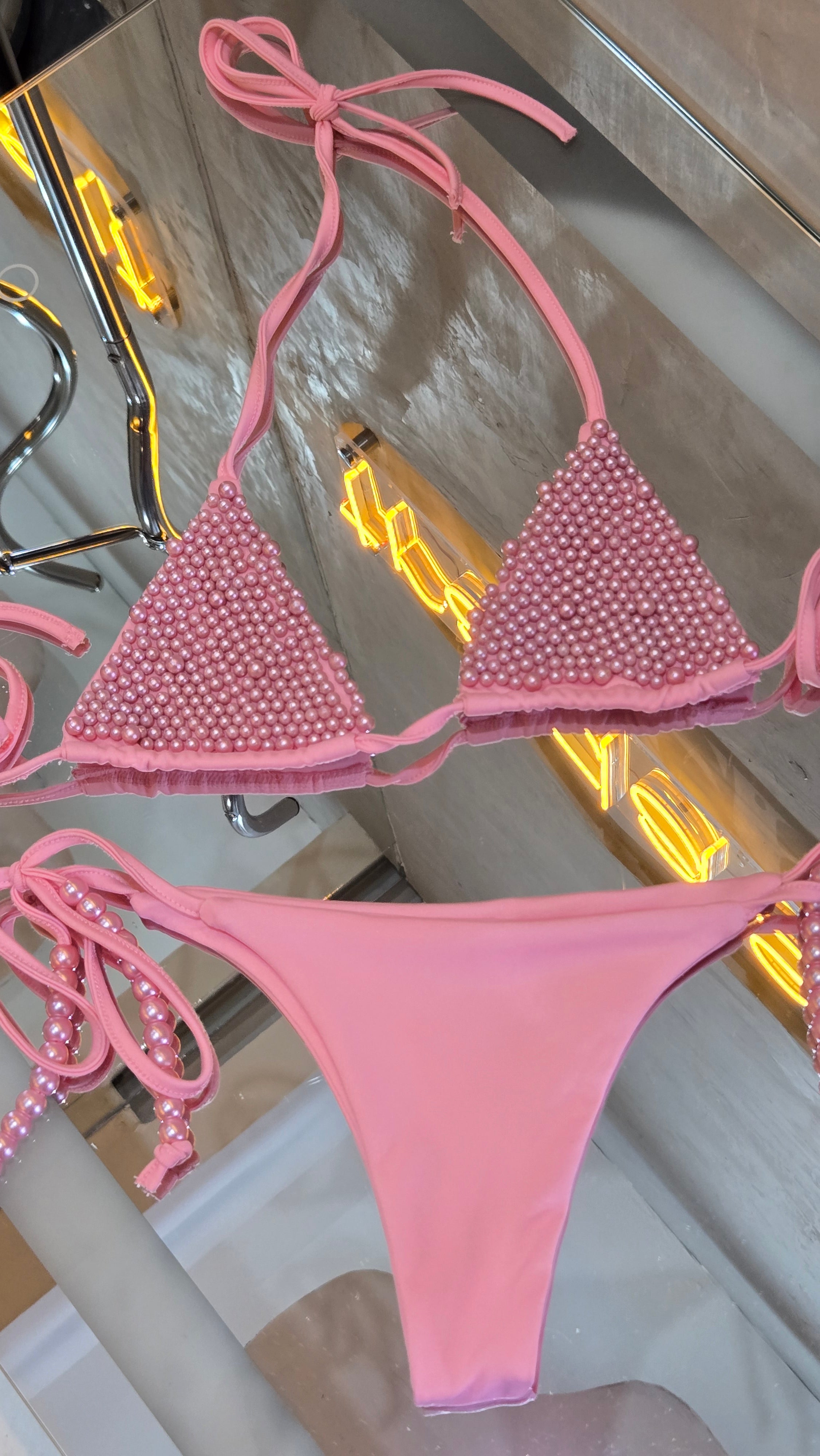 Traje de baño rosa perlas